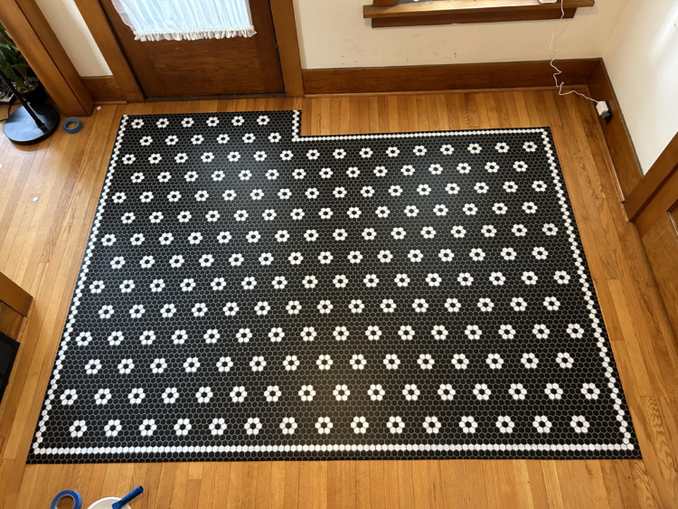 My finished DIY waterproof vinyl floor rug in a vintage hex tile flower pattern